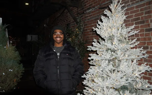 Me standing next to a white tree