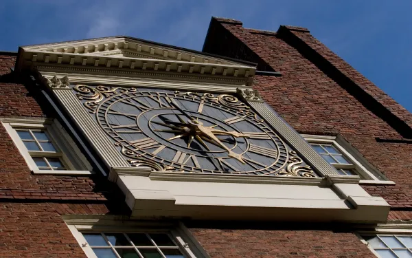 Clock on Side of Building