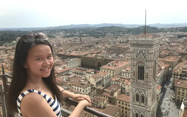 Author on balcony looking out across Florence 