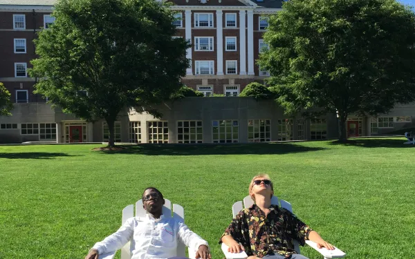Photograph of author and friend on lawn